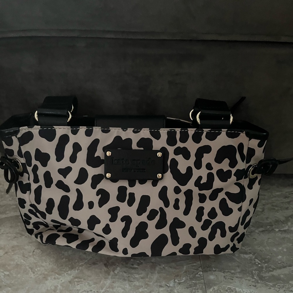 Kate Spade NWOT animal print nylon and leather handbag.